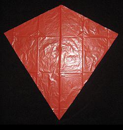 The Simple Diamond - the sail cut out and edged with tape.