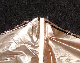The 1-Skewer Roller - close-up of spar tip secured with sticky tape The 1-Skewer Roller - close-up of spar tip secured with sticky tape