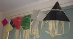 Learn how to make paper kites, from just A4 or Letter copier paper and sticky tape. Explained step by step with close-up photos. Only sound and well-tested designs here.