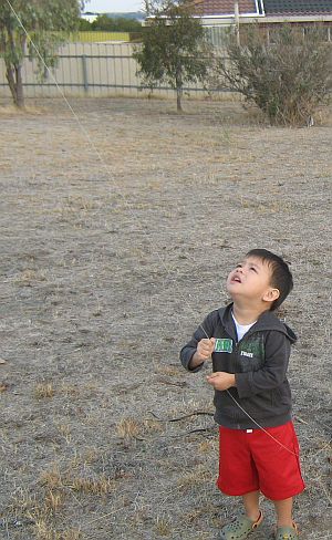 Child Flying Kite - Aren flying the Dowel Rokkaku.