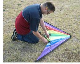 Out on the field, with the Delta stunt kite nearly ready to fly. Out on the field, with the Delta stunt kite nearly ready to fly.
