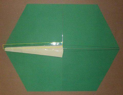 The Paper Rokkaku kite - one edge taped, before trimming tape.