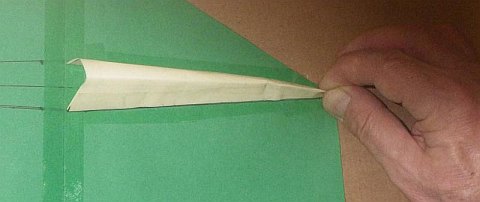 The Paper Rokkaku kite - pinching started at one end.