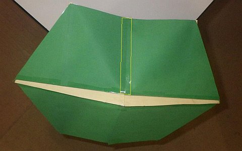 The Paper Rokkaku kite - one side of the sail joined completely with tape.