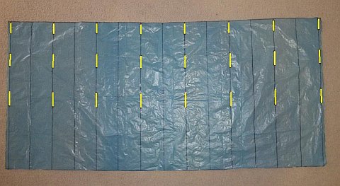 The Parachute kite - where to cut slits in lower surface plastic.
