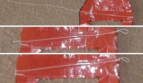 The Octopus kite - completing a bridle attachment point.