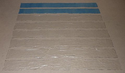 The Octopus kite - plastic rectangles 15cm (6”) x 150cm (60”) cut for the 8 tail extensions.