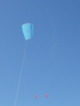 The MBK Multi-Dowel Sled kite in flight with twin drogues.