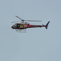 The WestPac Rescue Helicopter in flight over the sea. The WestPac Rescue Helicopter in flight over the sea.