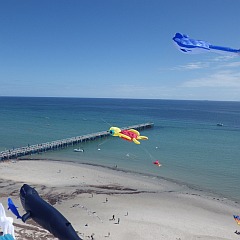 People could walk beside the registered kite area, but the tide began to restrict the corridoor.