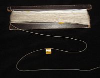 A flying line marked at intervals with little yellow flags of insulation tape. A flying line marked at intervals with little yellow flags of insulation tape.