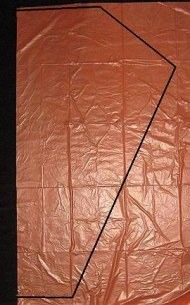 The Dowel Barn Door - template shape marked on plastic bag. The Dowel Barn Door - template shape marked on plastic bag.