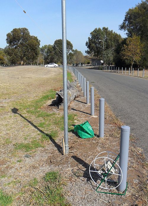 The tether-point - a smooth metal sign post.