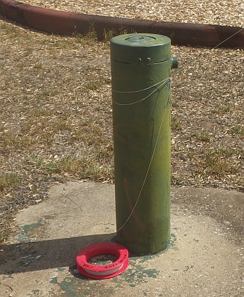 Cinch to a pole with a 'pimple'.