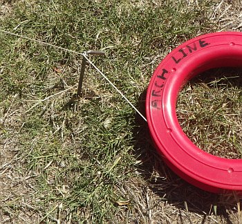 Line cinched to a tent-peg.